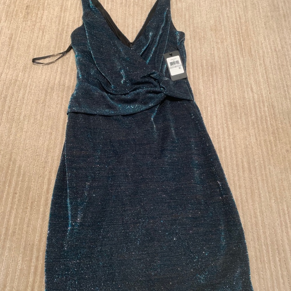 Cocktail party dress! Hits just above the knees!